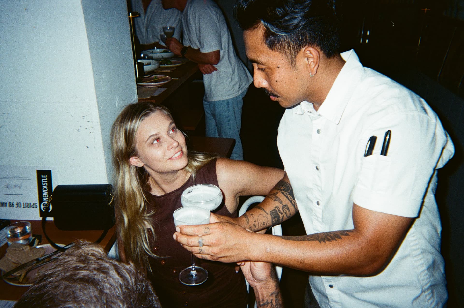 A drink handed over at the bar